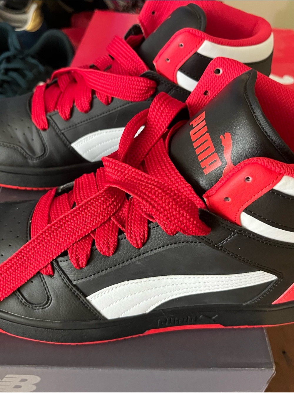 Puma  Black, Red & White High-Top Sneakers